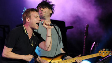 Damon Albarn and Alex James from Blur performing at Glastonbury